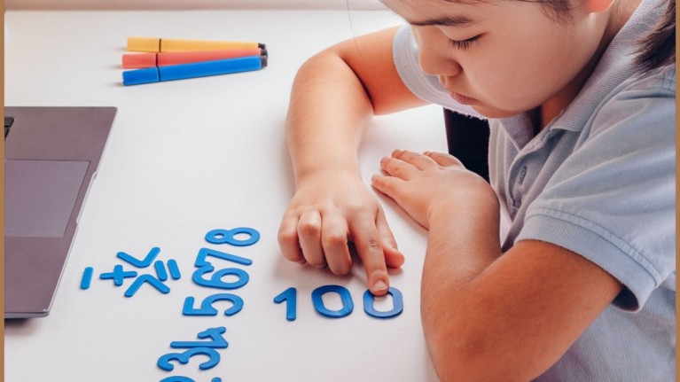 Girl Learning Math at Home