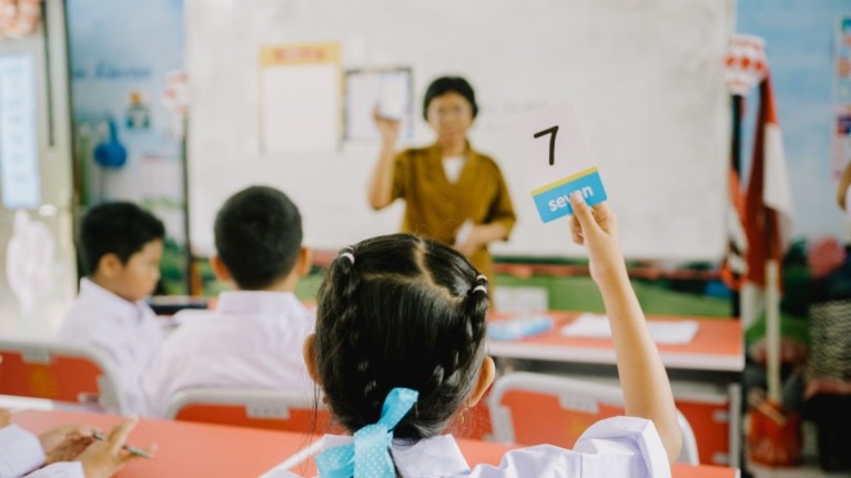 image of a classroom with teacher and students