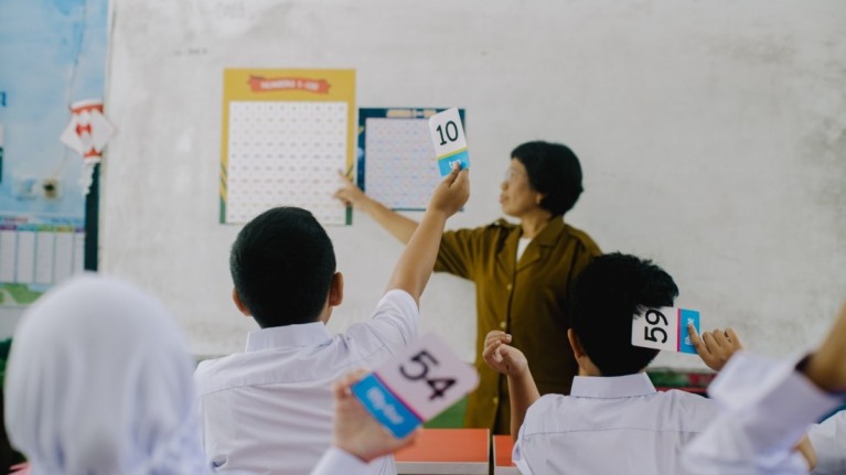 image of a classroom with teacher and students